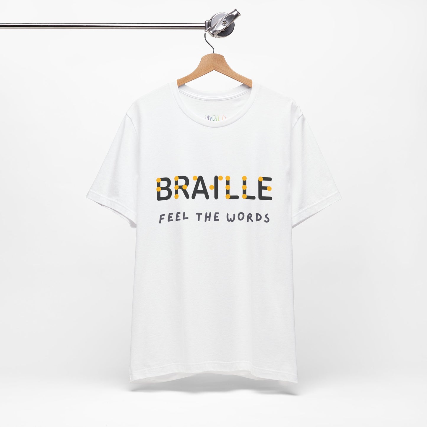 White t-shirt with black, yellow and gray text 'Braille Feel the Words'