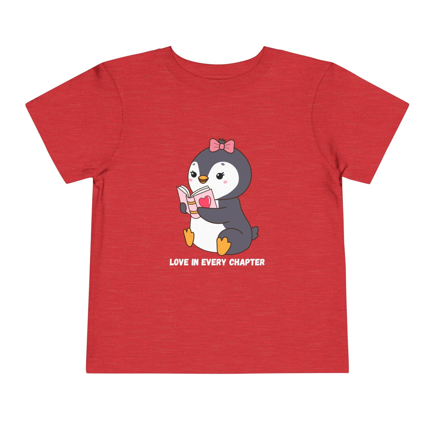 Red toddler t-shirt with a penguin reading a book and text 'Love in every chapter'