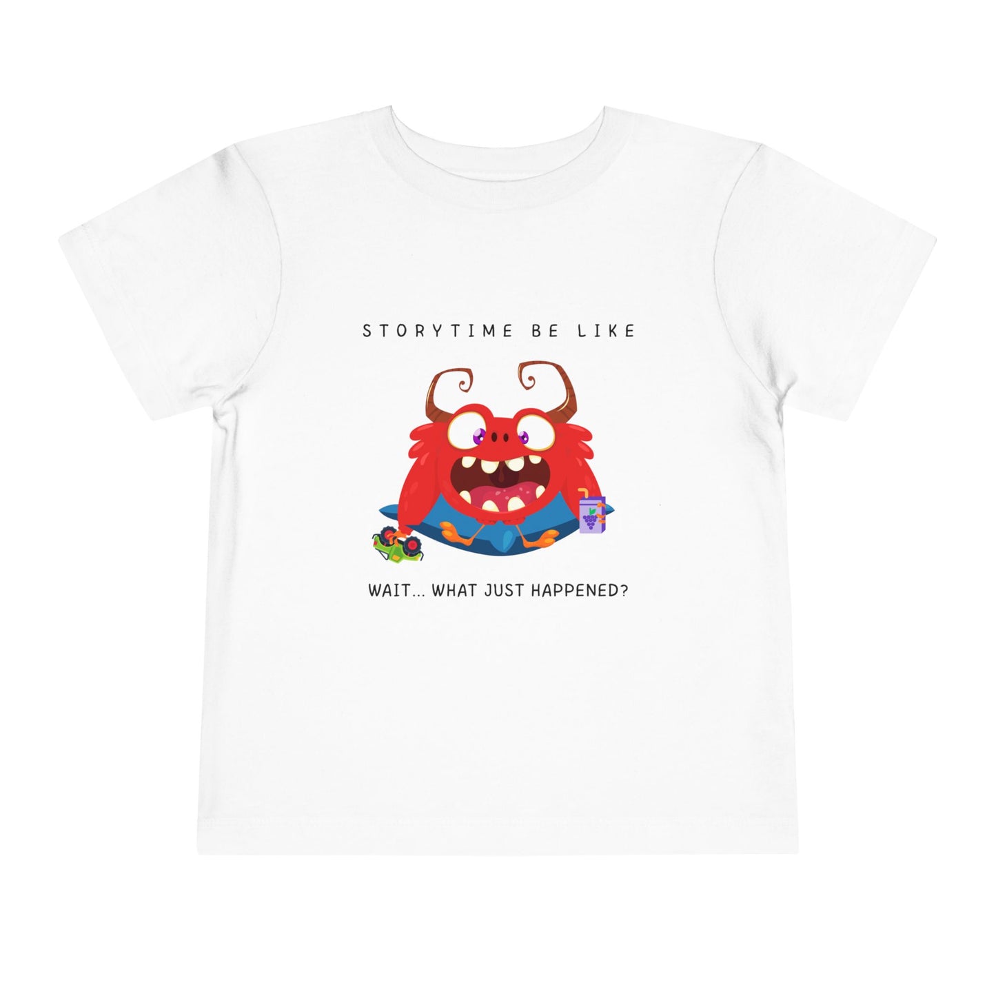White toddler t-shirt with a cartoon monster holding a toy and a juice box, text 'Storytime be like wait...what just happened?'