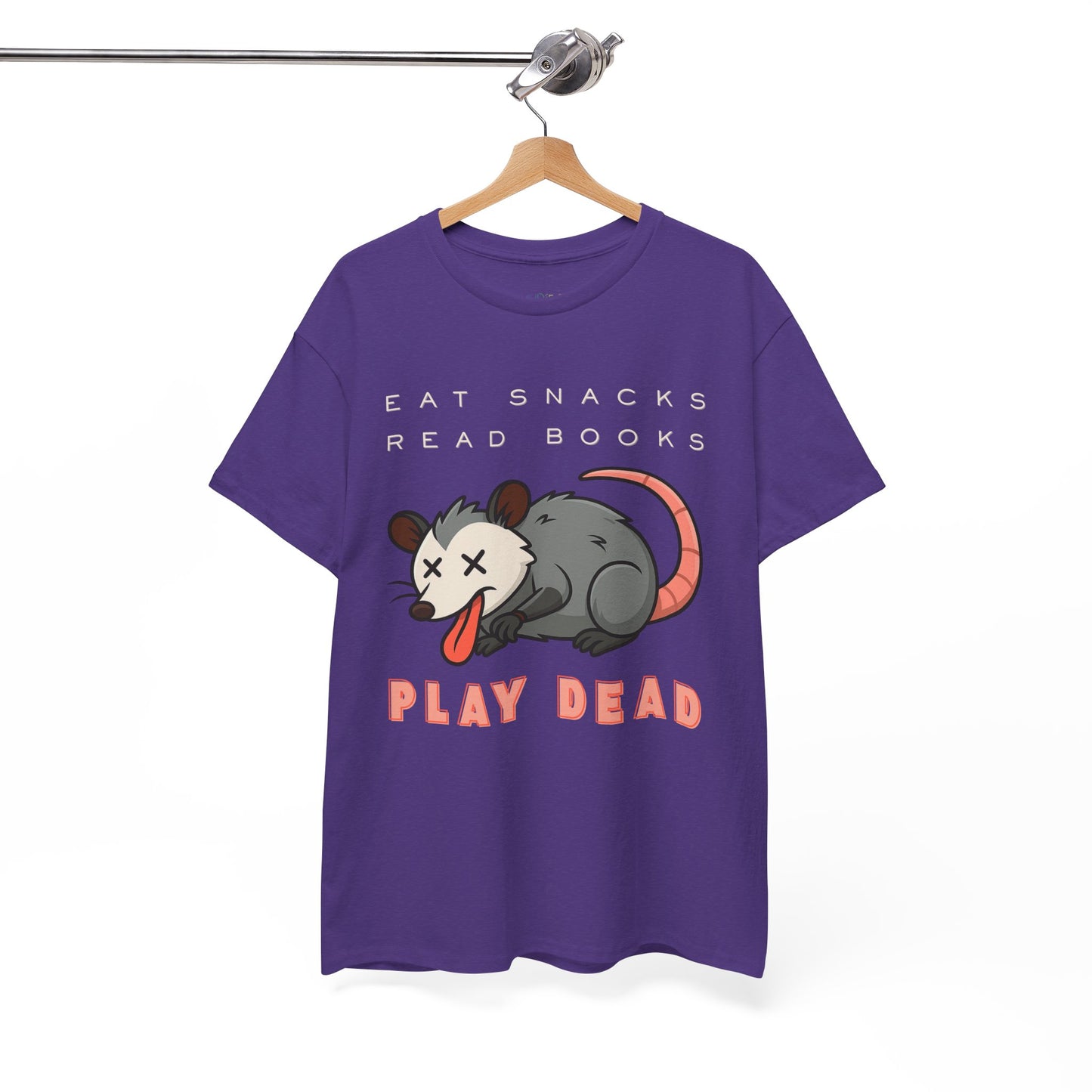 Purple t-shirt with an opossum graphic and text 'Eat Snacks. Read Books. Play Dead.'