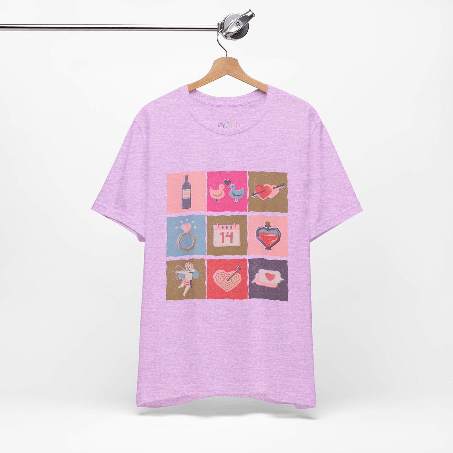 Light purple t-shirt with colorful graphic design of Valentine's Day images stacked in blocks