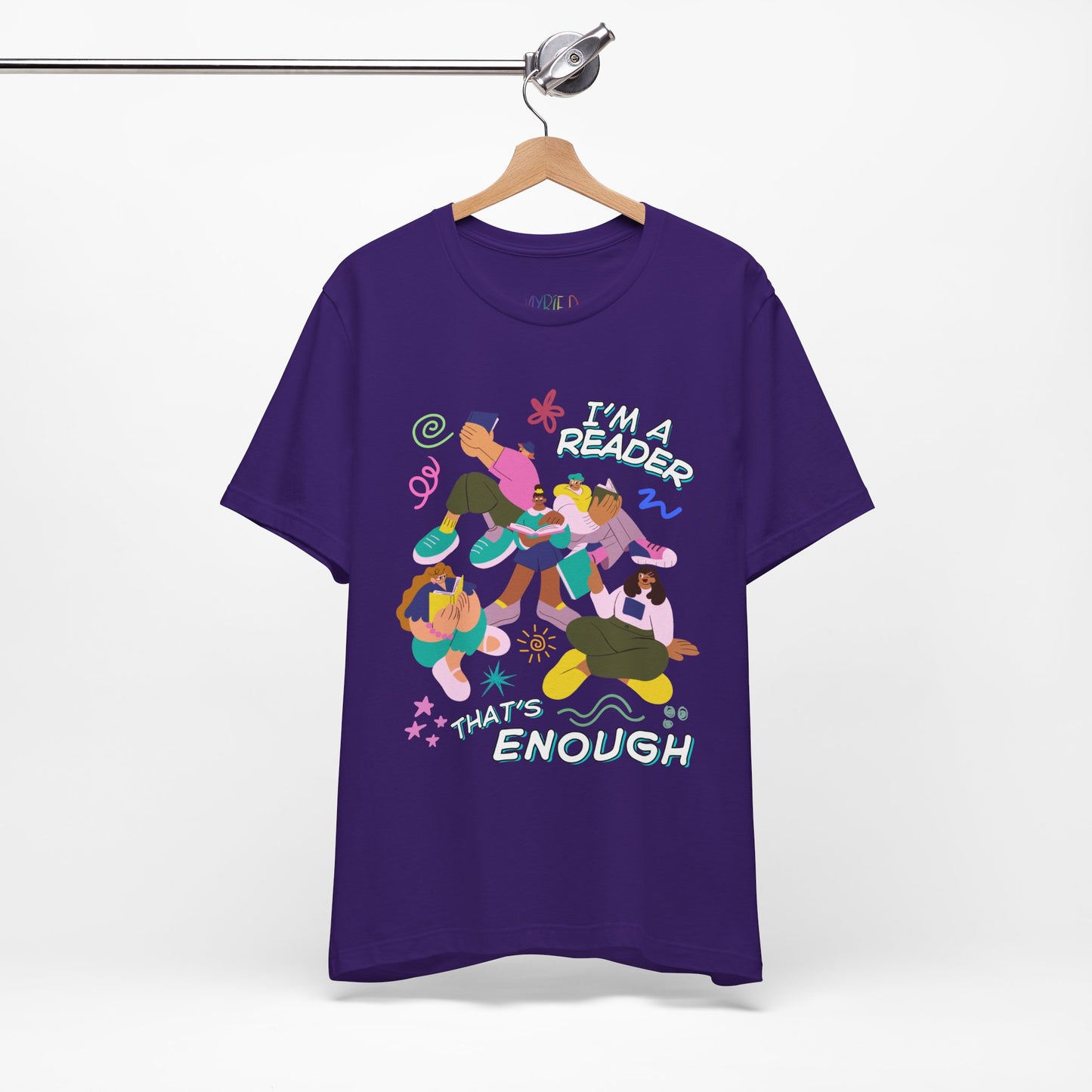 Purple t-shirt with modern people reading books, surrounded by colorful doodles and playful text 'I'm a Reader That's Enough'