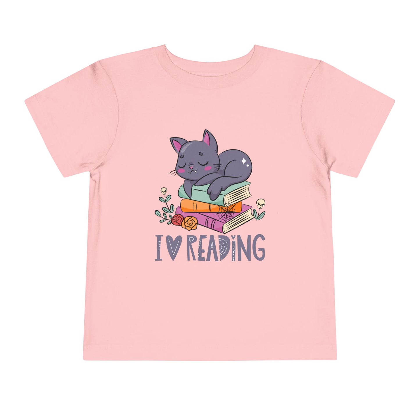 Pink toddler t-shirt with a gray cat sleeping on some books, surrounded by flowers and 'I love reading' text
