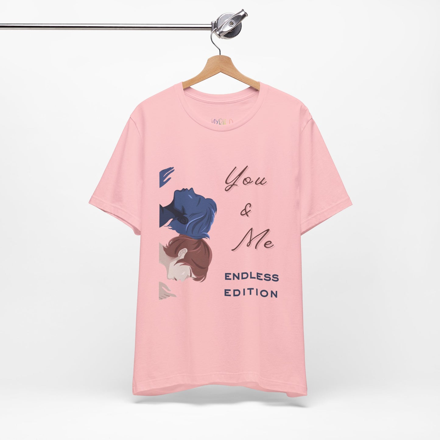 Pink t-shirt with a vertically stacked image of two heads back to back on one side and text on the other site 'You & Me Endless Edition'