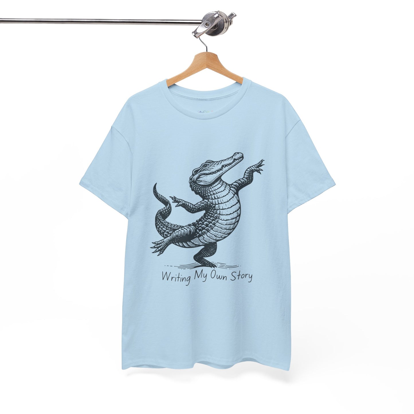 Light blue t-shirt with dancing alligator graphic and text 'Writing My Own Story'