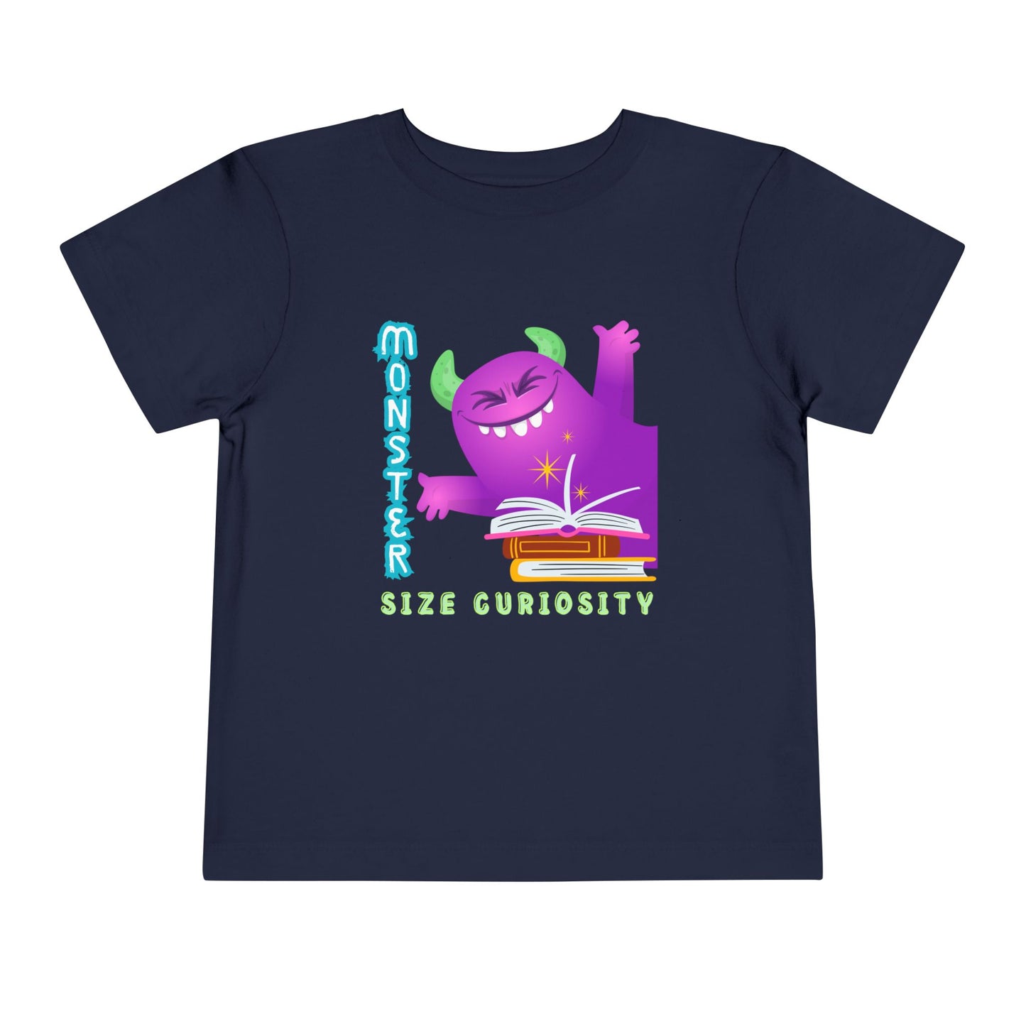 Navy t-shirt with a happy purple monster, a pile of books and text 'Monster Size Curiosity'