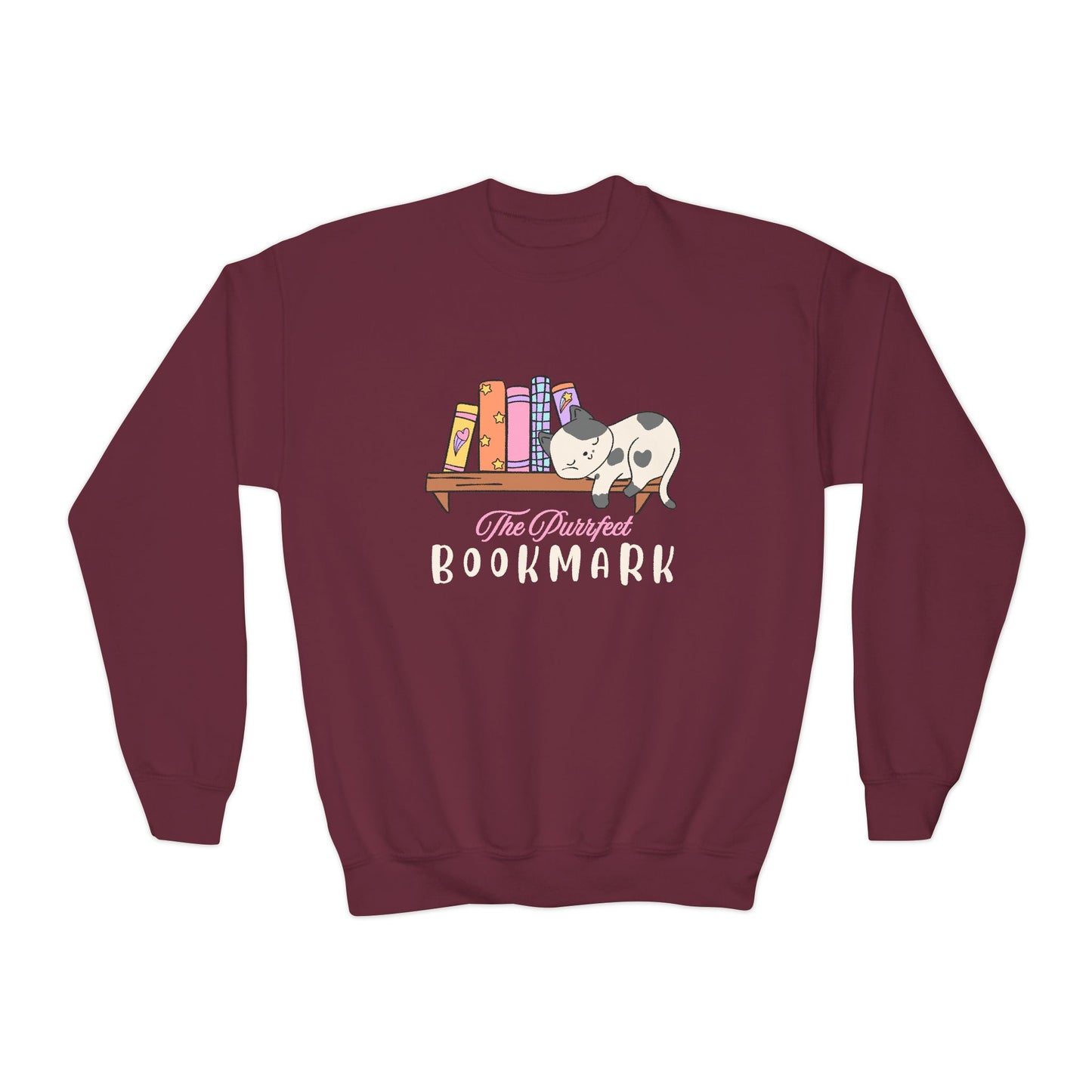 Maroon sweatshirt with a cat sleeping on a book shelf and text 'The Purrfect Bookmark'