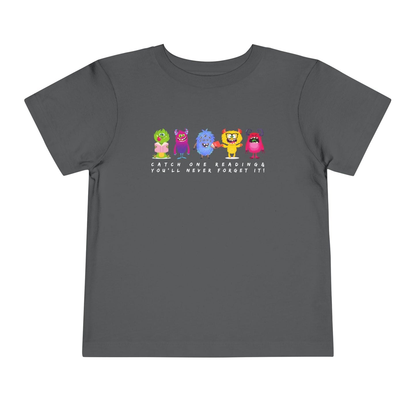 Gray toddler t-shirt with colorful monsters all lined up in a row and text 'Catch One Reading & You'll Never Forget It!'