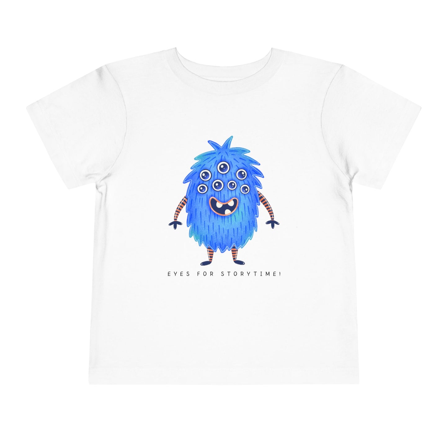 White toddler t-shirt with a blue multi-eyed cartoon monster and text 'eyes for storytime!'