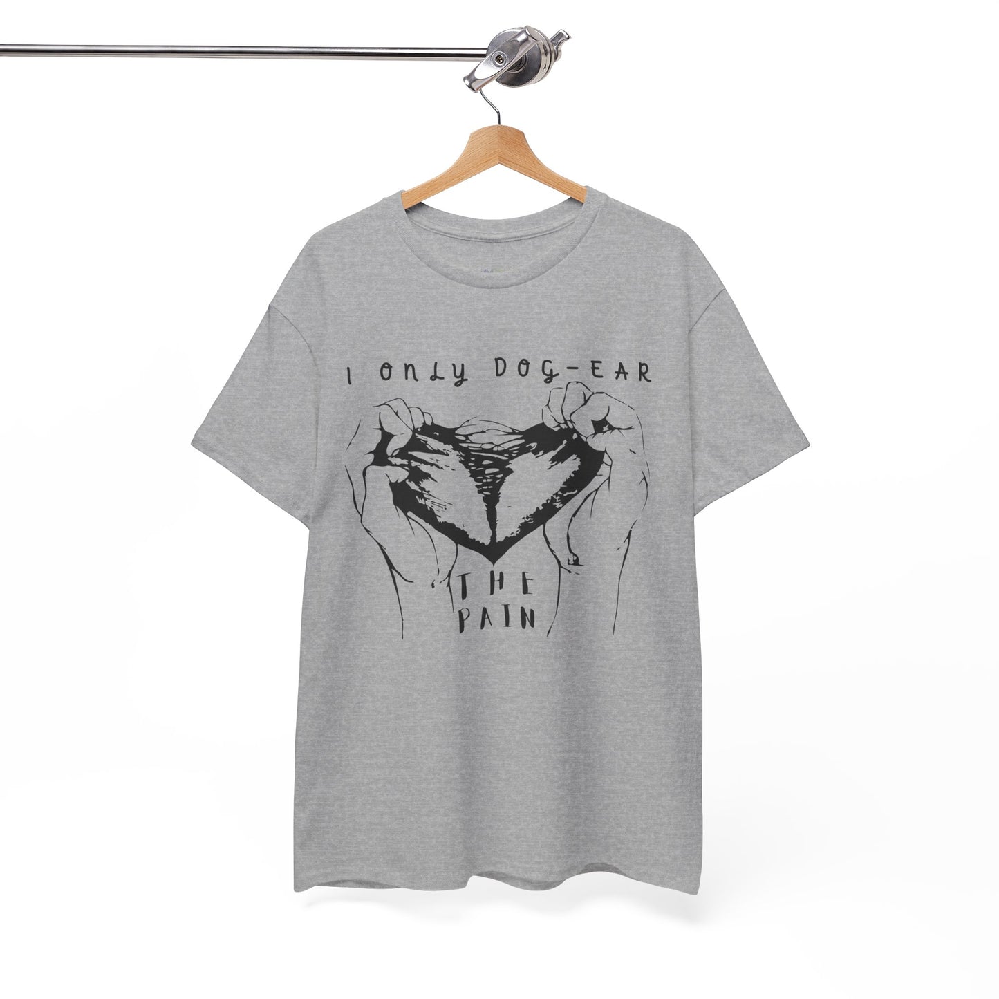 Gray t-shirt with black graphic of hands tearing apart a heart and text 'I Only Dog-Ear The Pain'