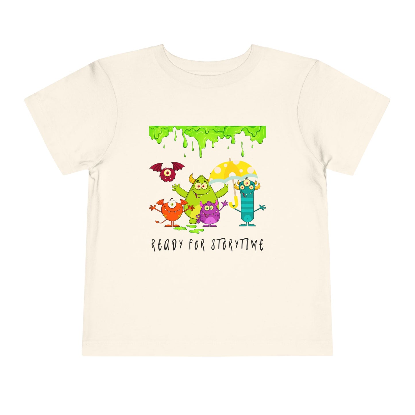 Beige toddler t-shirt with colorful monster characters, an umbrella and green dripping slime, 'Ready for Storytime' text