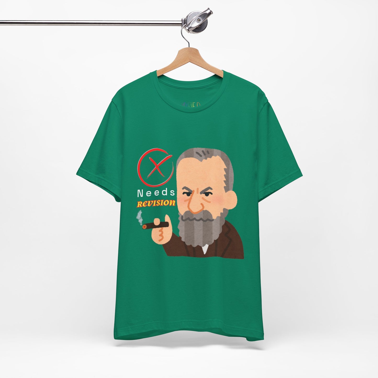 Green t-shirt with a graphic design of a grumpy man smoking a cigar, a big red 'X' and text 'Needs Revision'