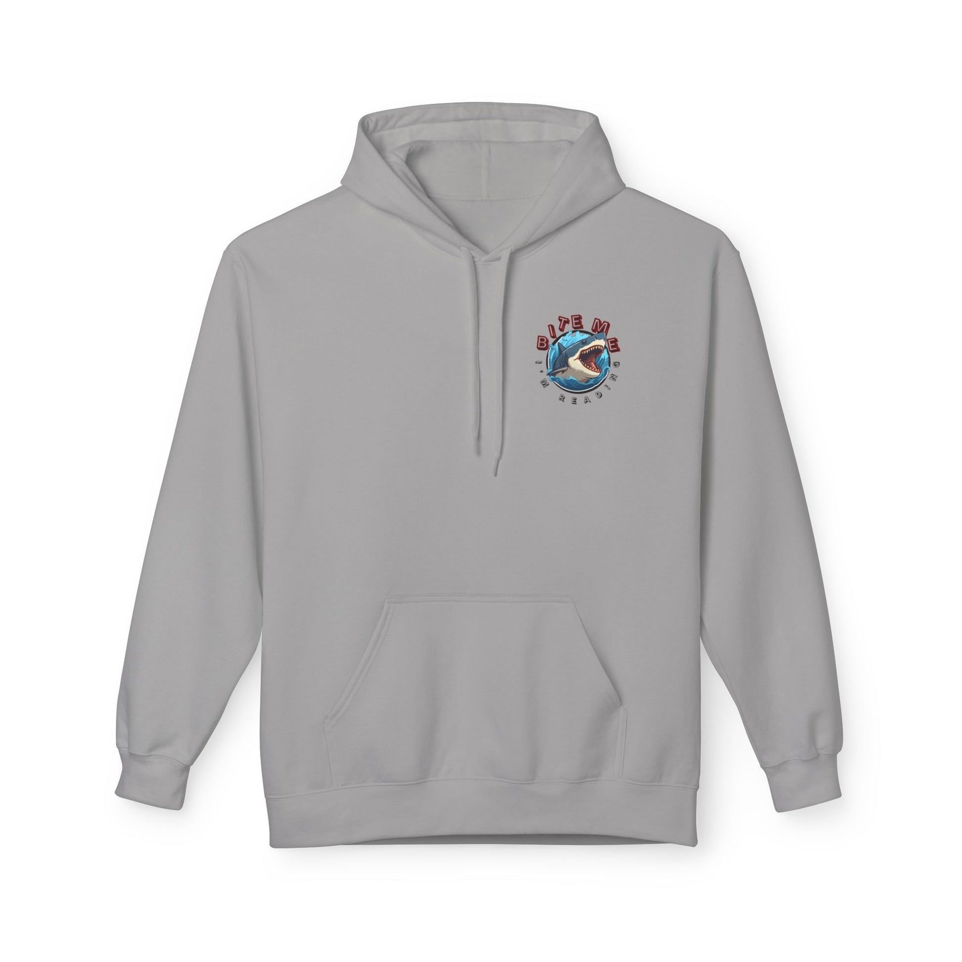 Light gray hoodie featuring a circular shark design with the text βBite Me, Iβm Readingβ in red and blue lettering.
