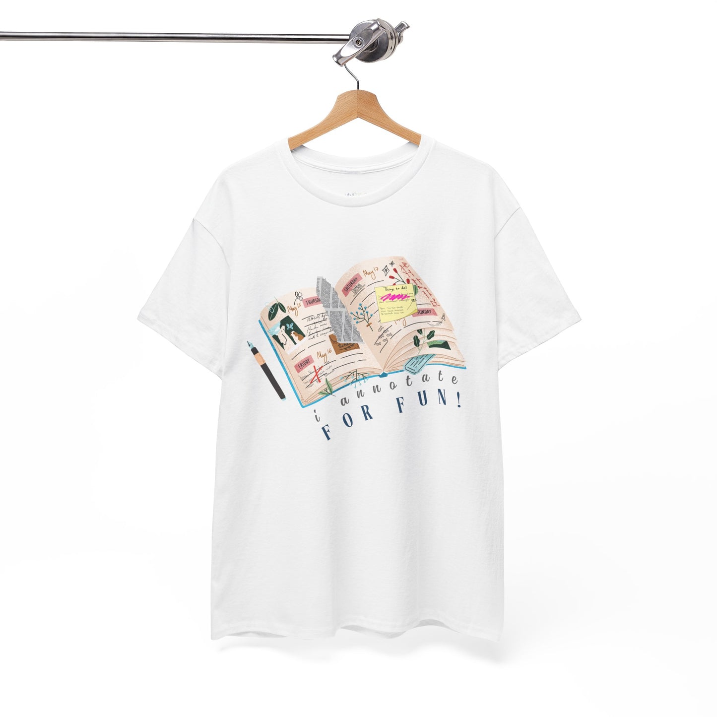 White t-shirt with a An open scrapbook full of scribbles, tickets, newspaper clippings and more, text 'I Annotate For Fun'