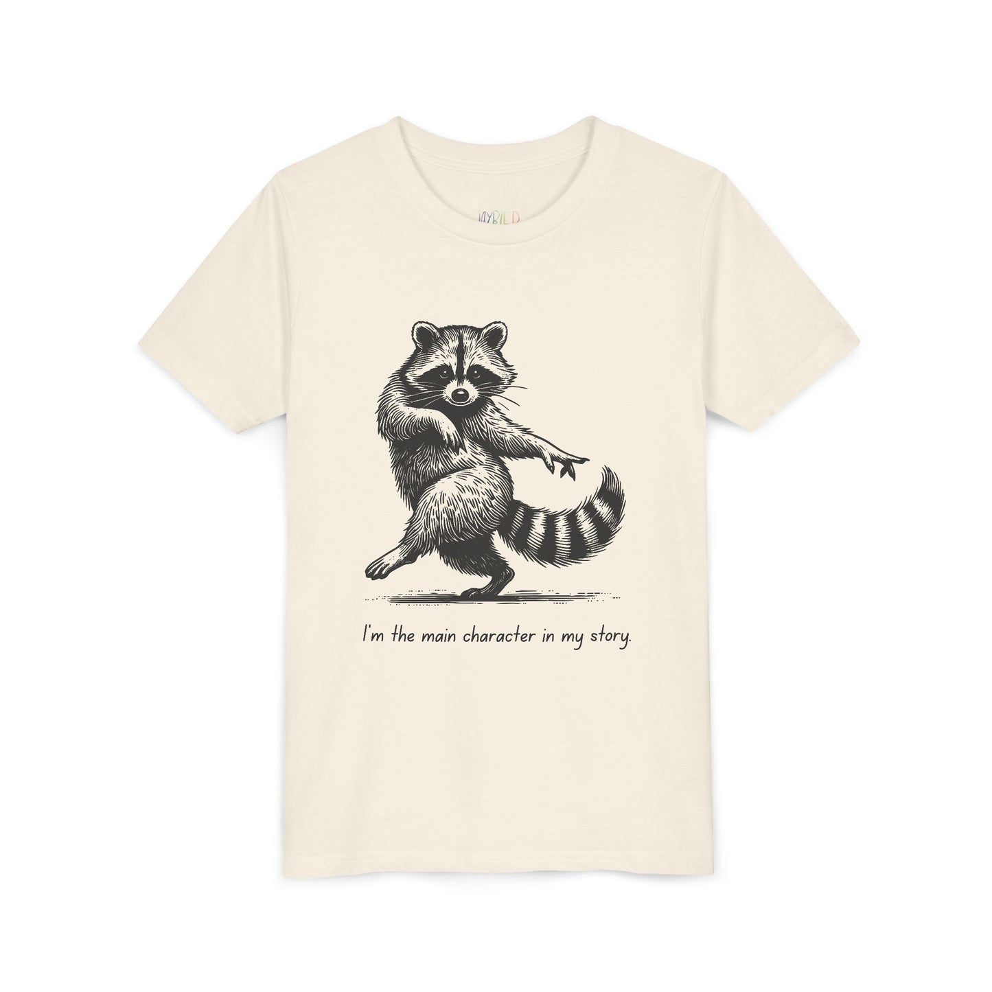 Beige t-shirt with a dancing raccoon and text 'I'm the main character in my story'