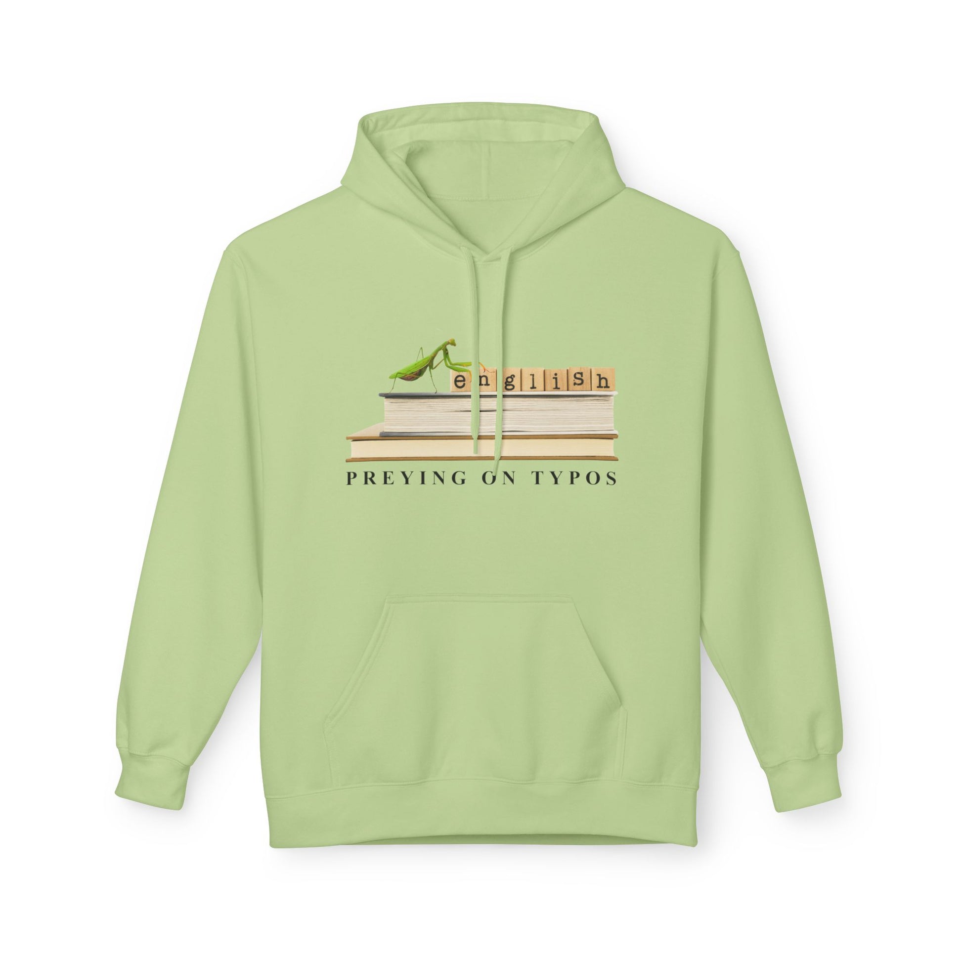 Light green hoodie featuring stacked books with Scrabble-style tiles spelling “English” and a green praying mantis perched on top. Text below reads “Preying on Typos.”