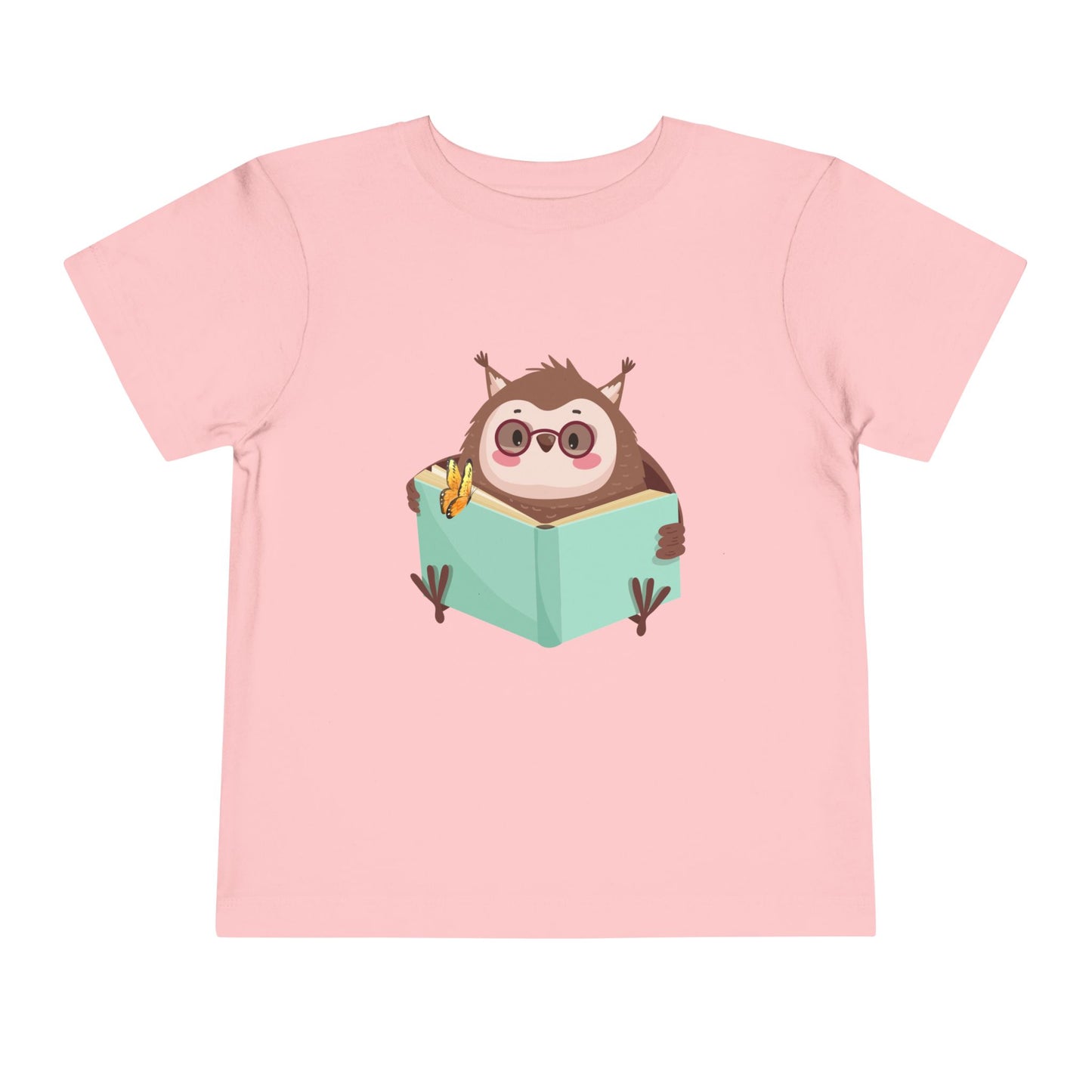 Pink toddler t-shirt with a cartoon own reading a book with a butterfly perched on top