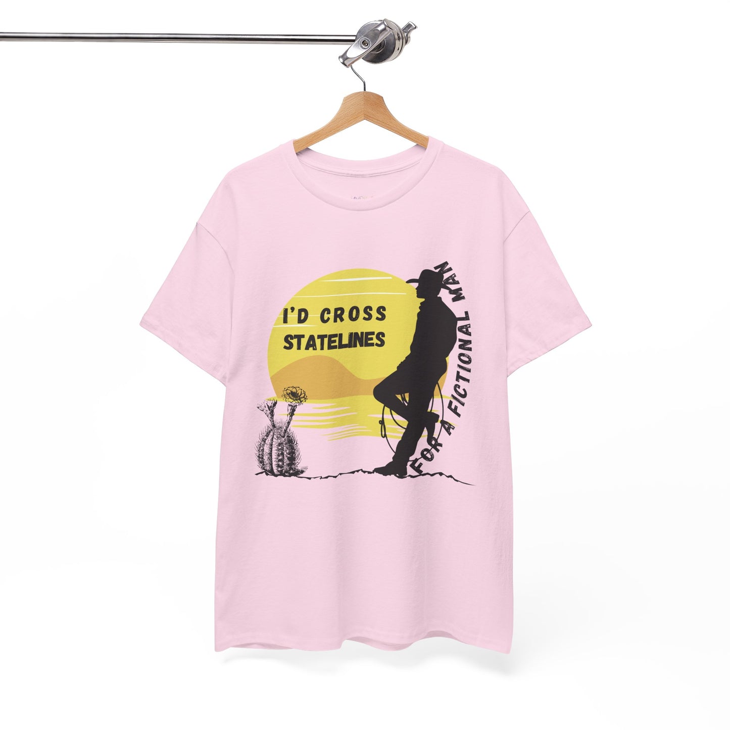 Pink t-shirt with silhouette of a cowboy at unset and text 'I'd cross Statelines for a Fictional Man'