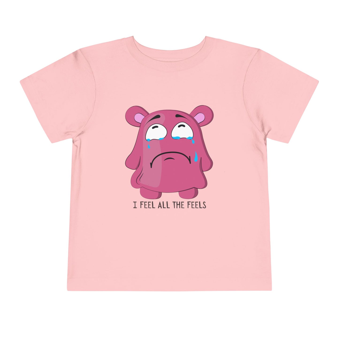 Pink t-shirt with a pink cartoon monster, dripping tears and text 'I Feel All The Feels'