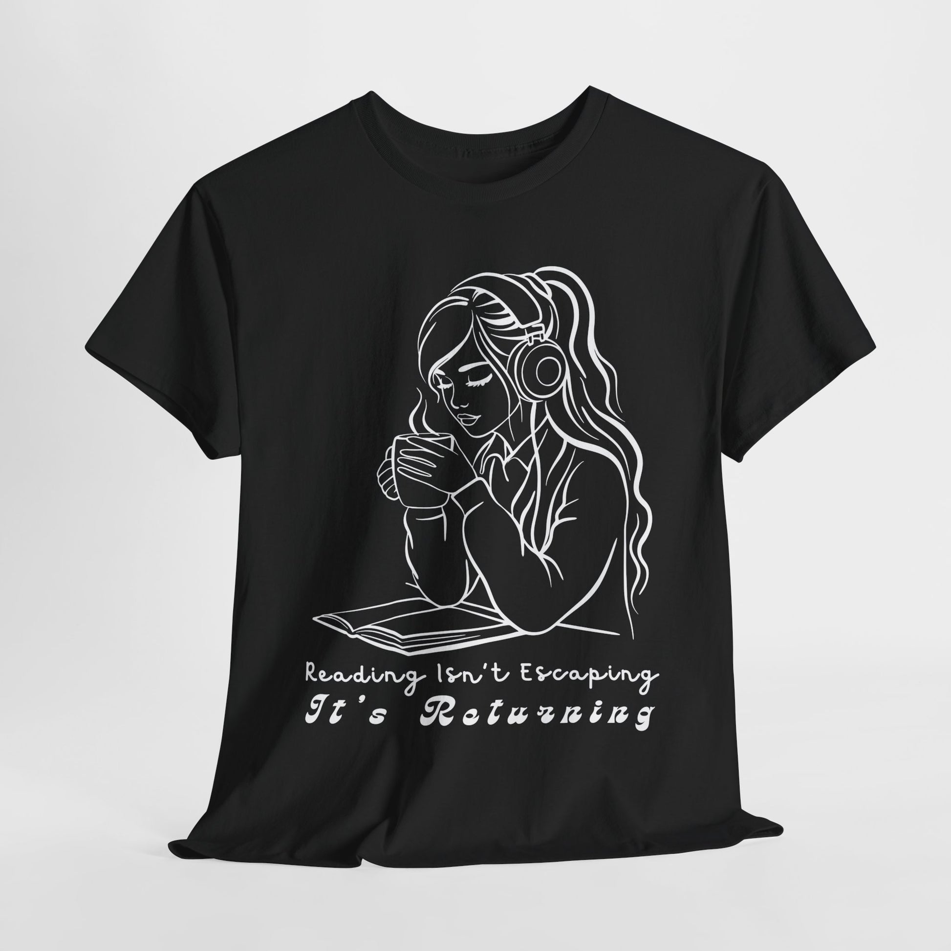 Black t-shirt with a white graphic of a woman wearing headphones, holding a steaming cup and reading a book, text "Reading Isn't Escaping. It's Returning.'
