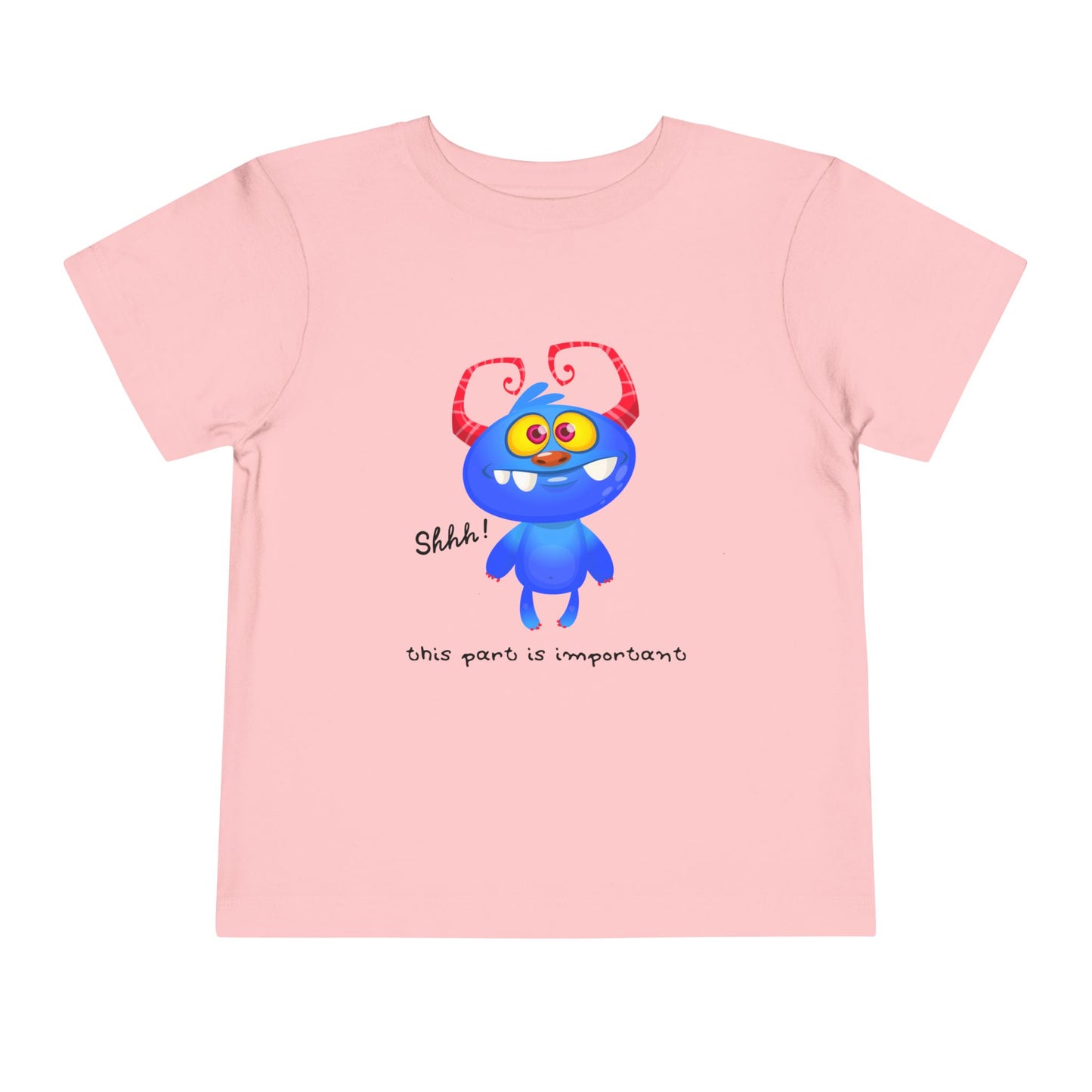 Pink toddler t-shirt with a blue monster and text 'shhh! this part is important'