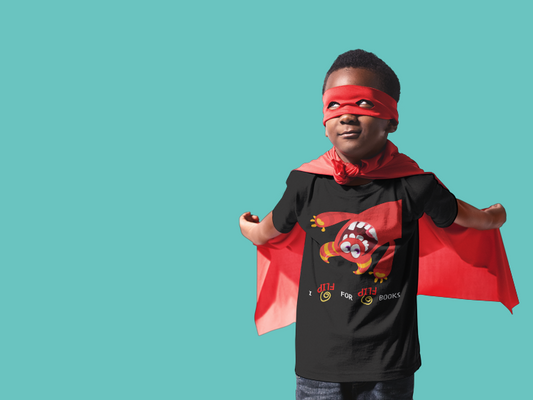 Little boy standing against a blue wall, as he hold back his red cape, looking up in his red eye mask, and monster t-shirt by Jaybie D.