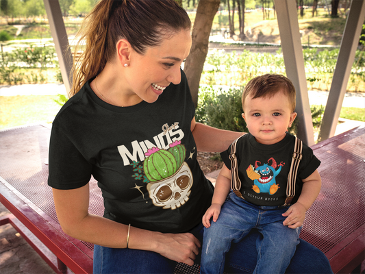 Mom and toddler in Halloween shirts.