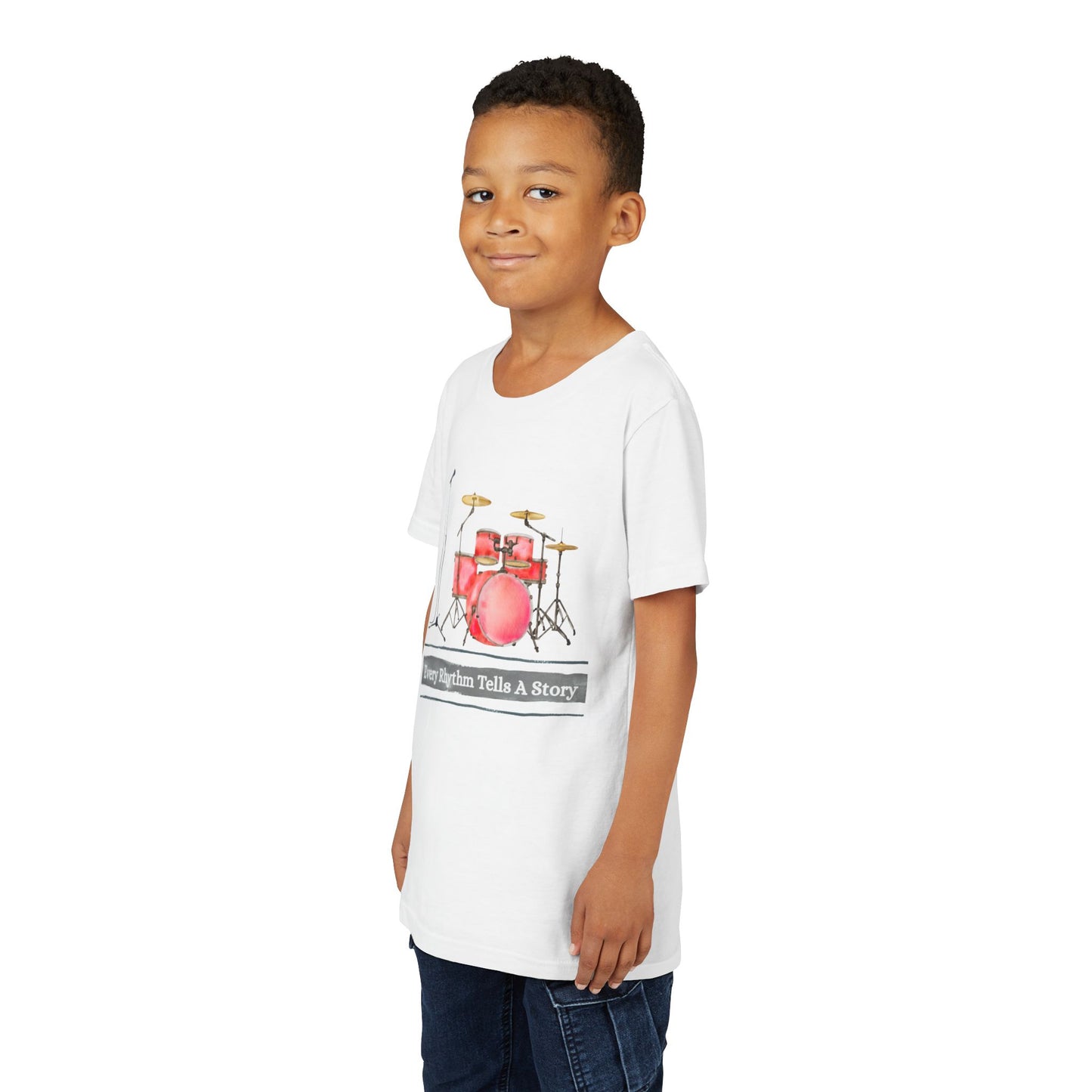 Boy wearing a white t-shirt with a microphone, drum set and text 'Every Rhythm Tells A Story' 
