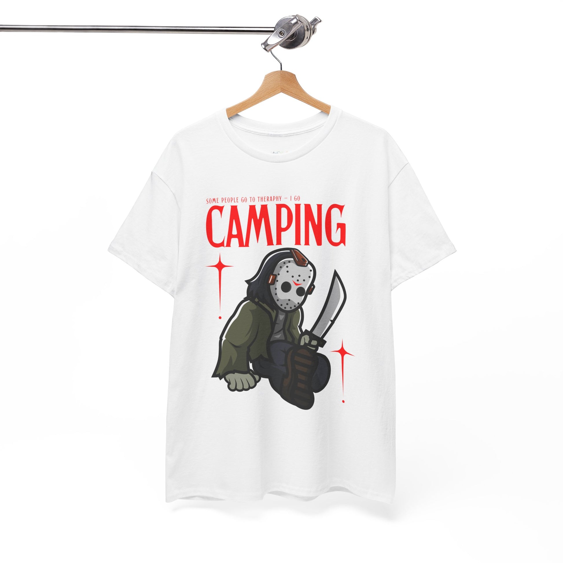 White t-shirt with a graphic design of a Jason character holding a knife and text 'Some People Go to Therapy...I Go CAMPING' on a hanger against a white background.