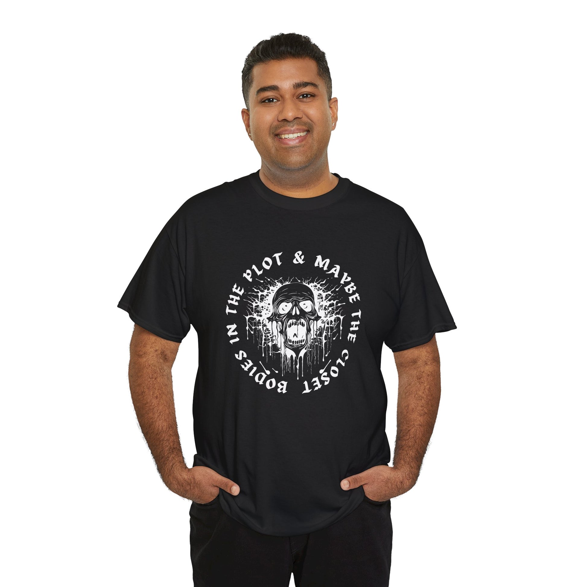 Man wearing a black t-shirt with graphic of a screaming skull and text 'Bodies In The Plot & Maybe The Closet' on a hanger against a white background