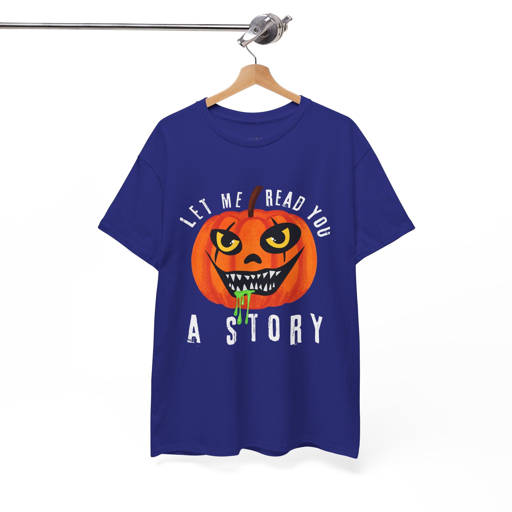 Blue t-shirt with an evil pumpkin graphic and text 'Let Me Read You A Story' on a hanger against a white background