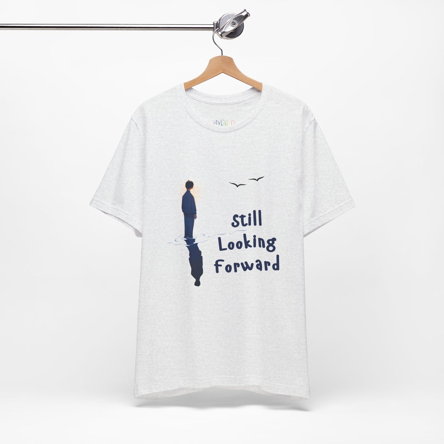 Light gray t-shirt with graphic of a person standing in the water with his reflection and text 'Still Looking Forward' 