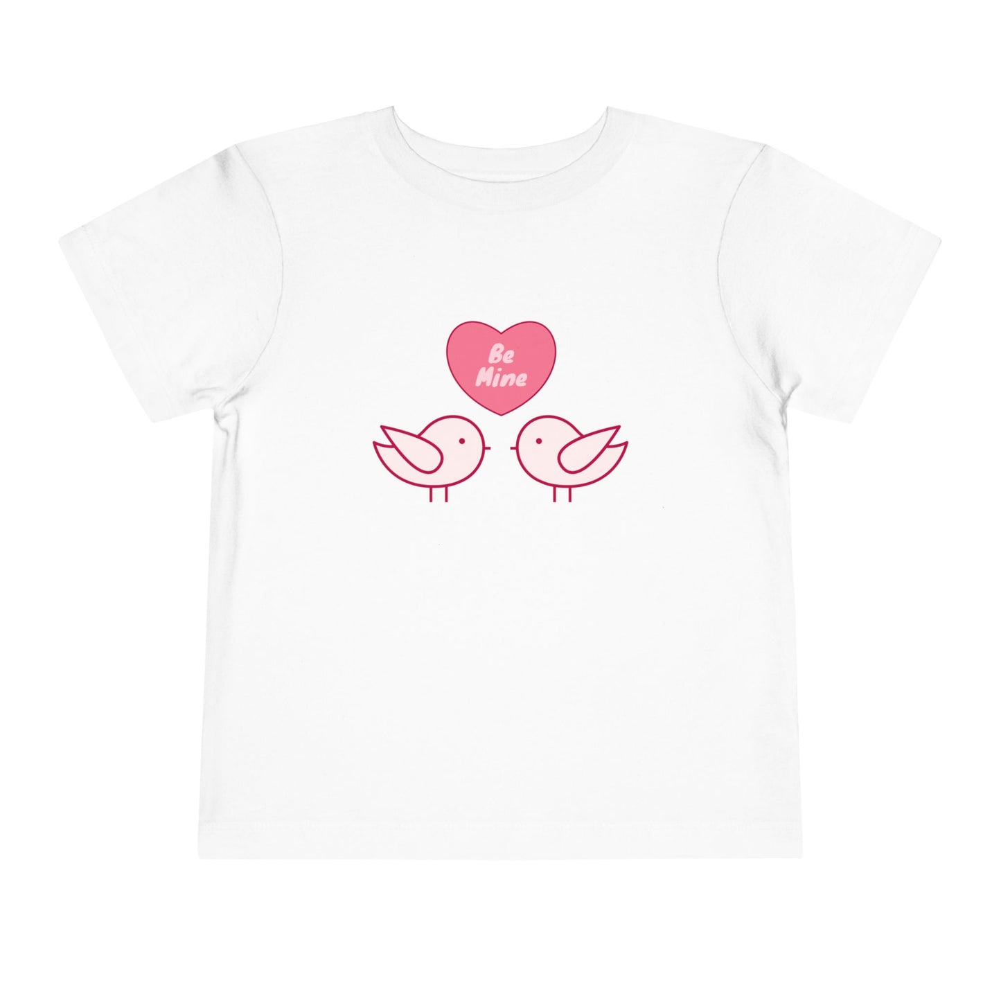 White toddler t-shirt with pink heart, two pink birds and 'Be Mine' text 