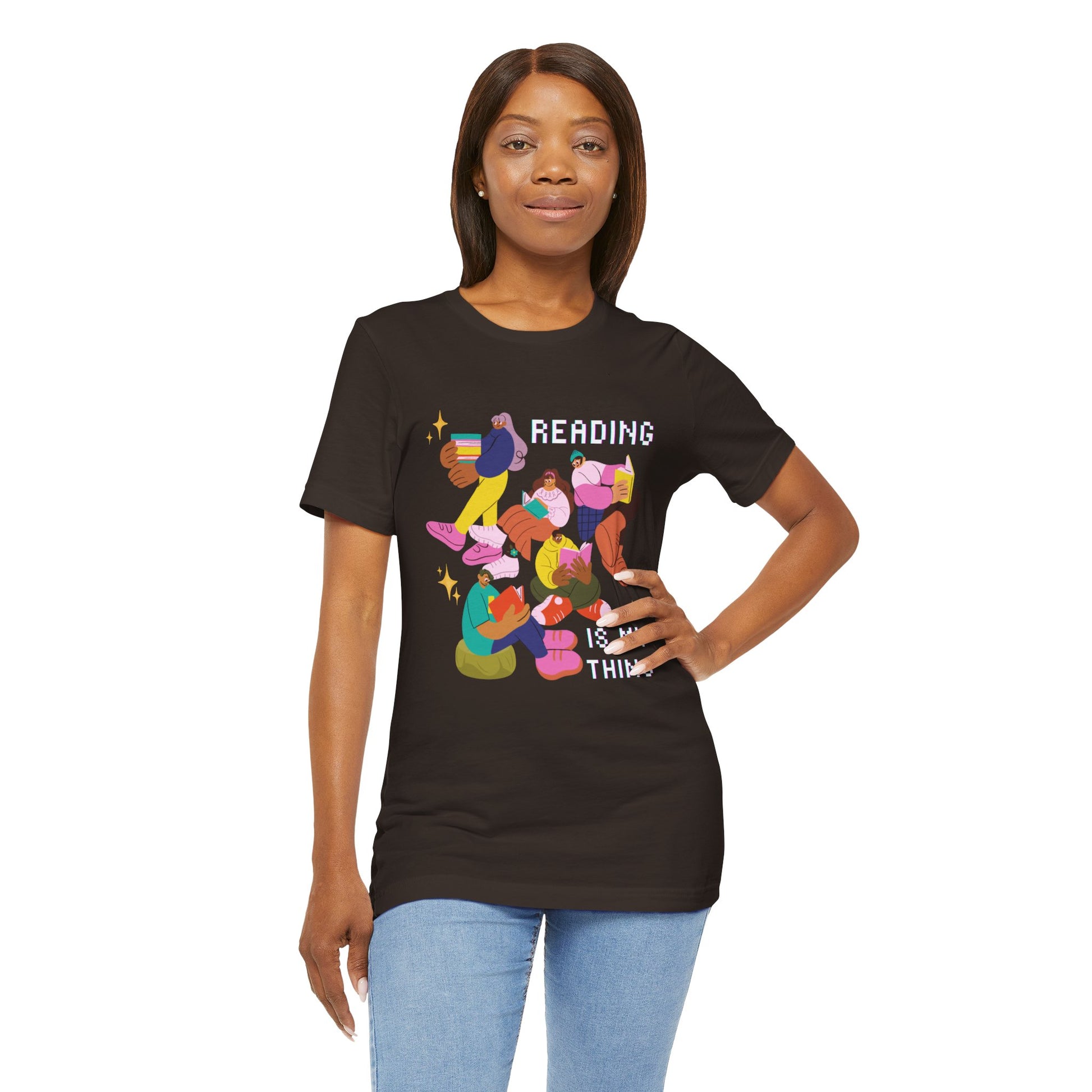 Woman wearing a brown t-shirt with colorful modern people reading books and 'Reading is my thing' text 