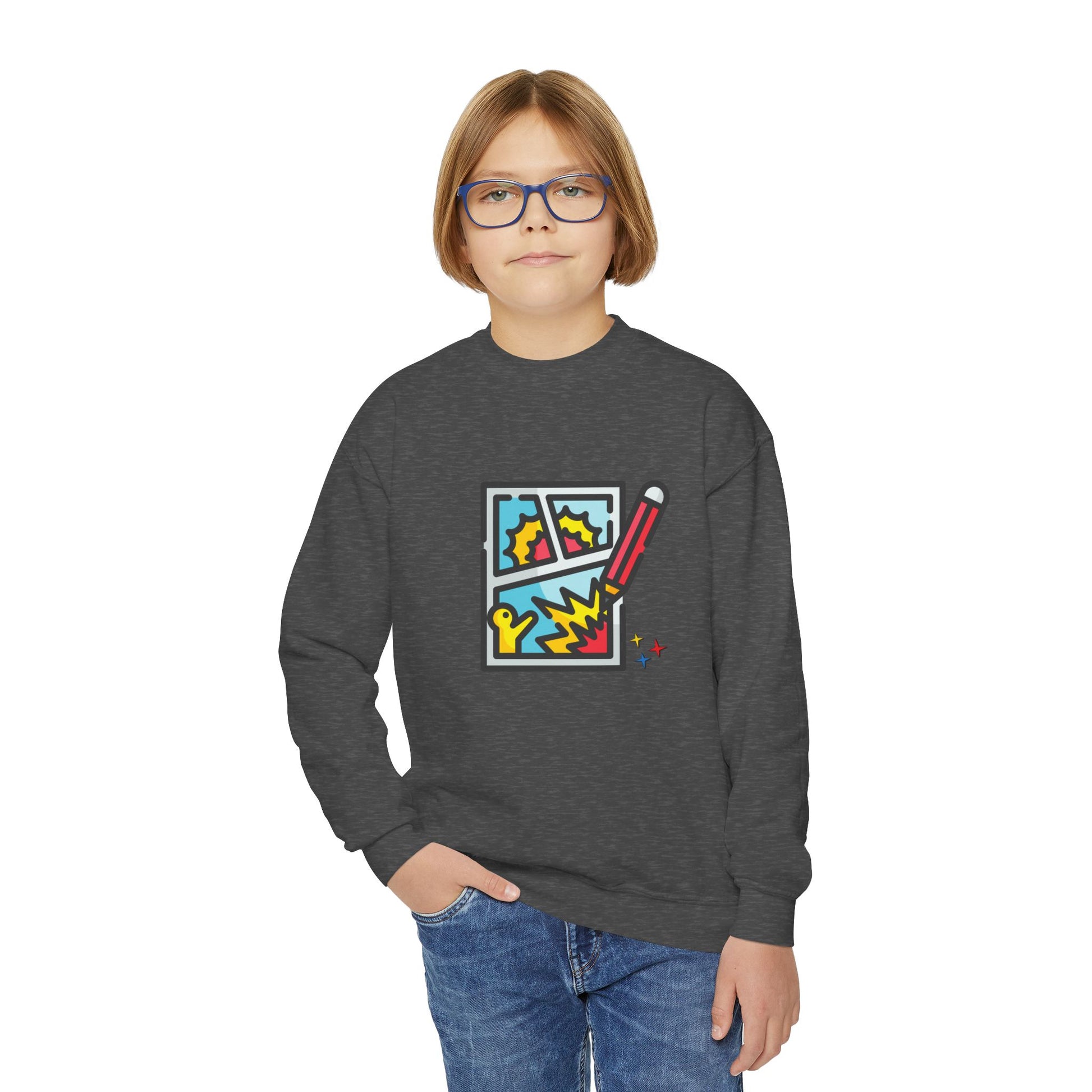 Boy wearing a dark gray sweatshirt with colorful comic book graphic drawing and pencil