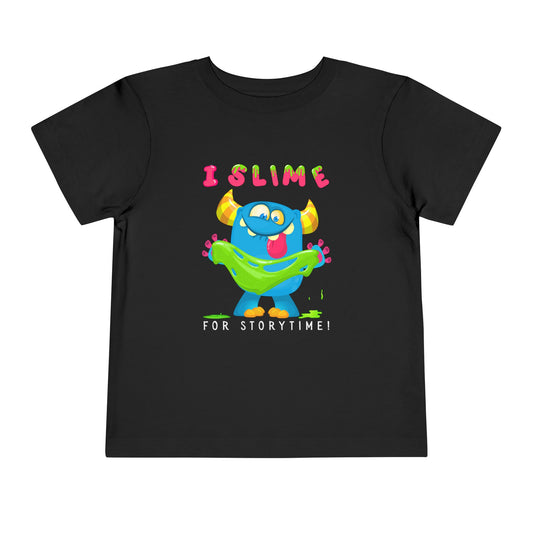 Black toddler t-shirt with a colorful monster graphic holding green slime and playful text 'I SLIME FOR STORYTIME!'