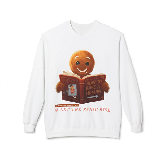 White sweatshirt with a gingerbread man reading a book titled 'How to Bake a Human' and text beneath 'Turn the Oven to 375 & Let the Panic Rise'