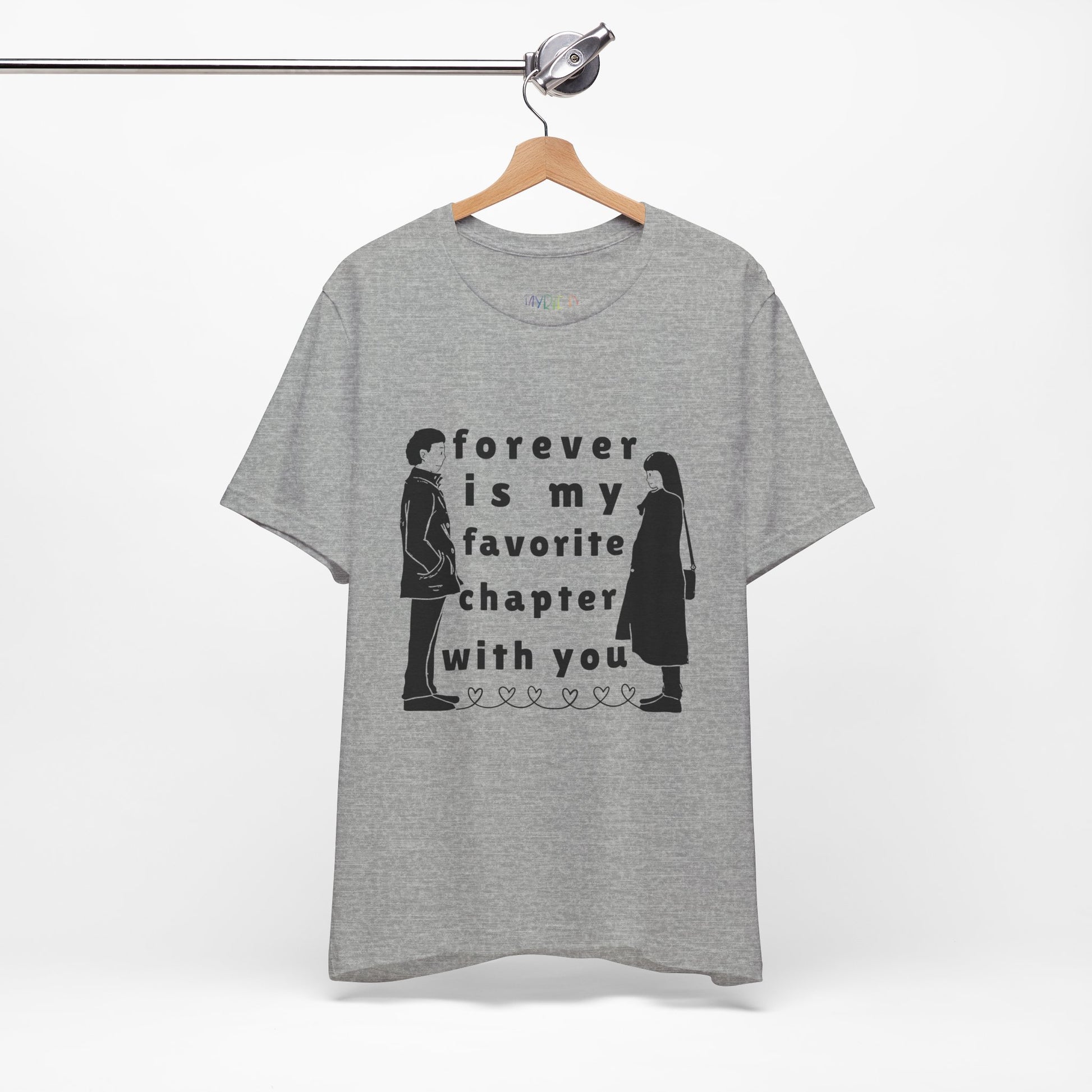 Gray t-shirt with black graphics of a man and woman facing each other and in between is text 'Forever Is My Favorite Chapter With You'