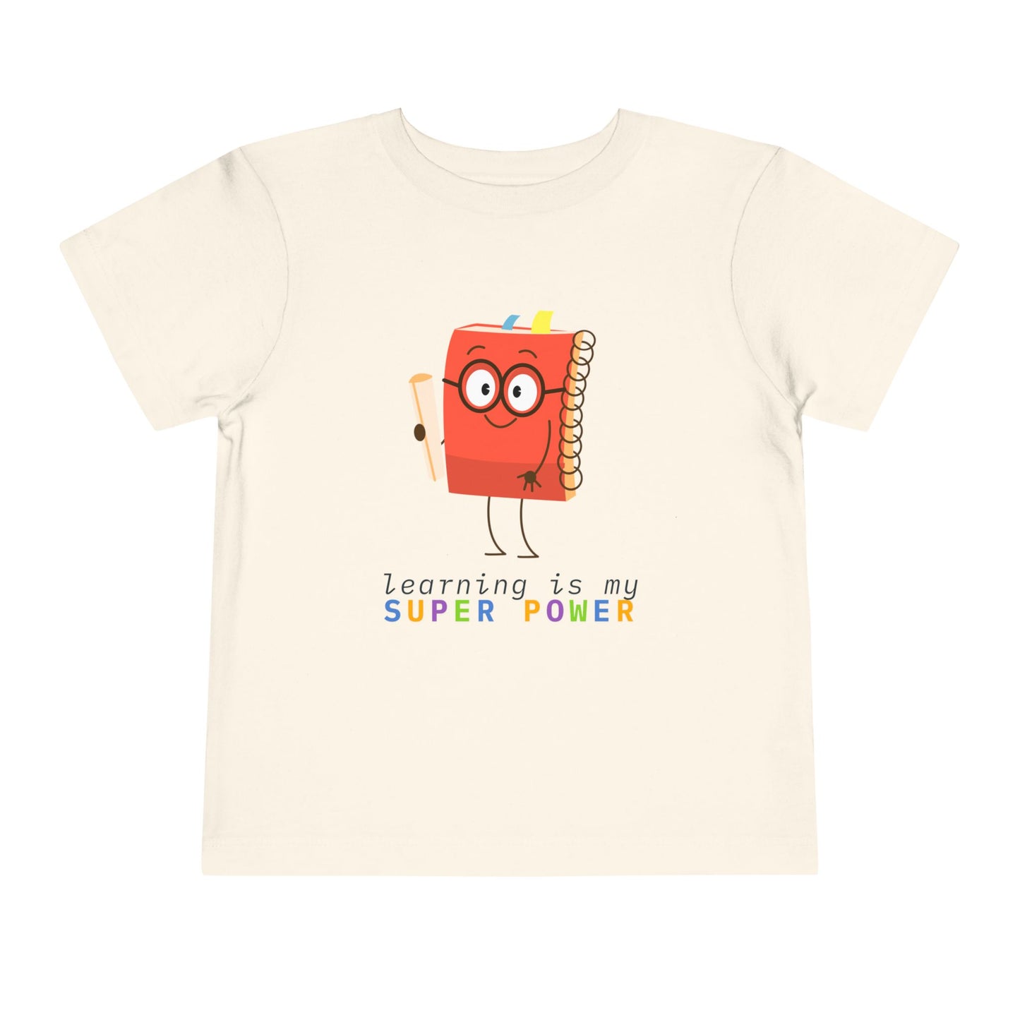 Beige toddler t-shirt with a cartoon book character and colorful 'learning is my super power' text 