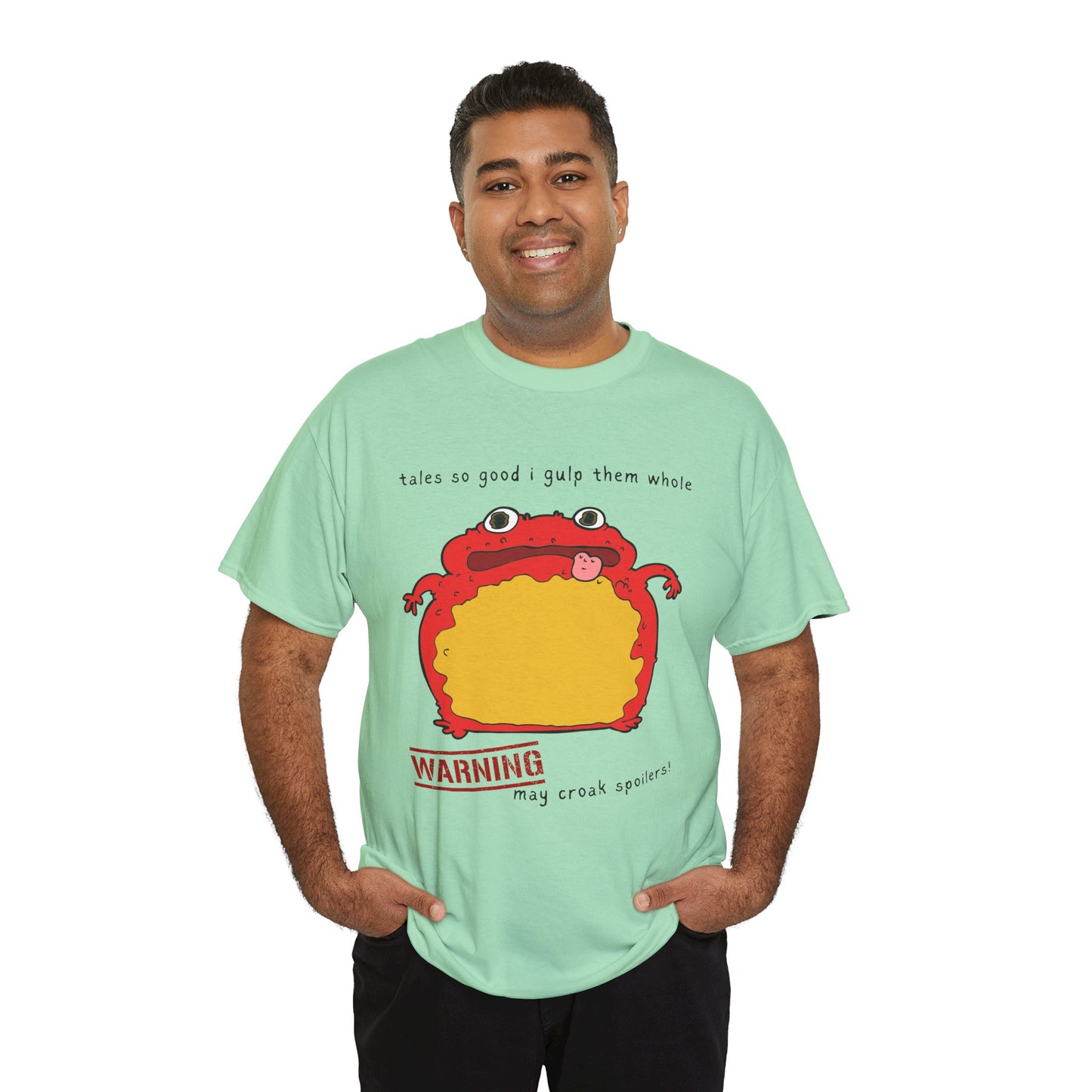 Man wearing a light green t-shirt with a red toad and text 'tales so good I gulp them whole' and 'WARNING may croak spoilers'