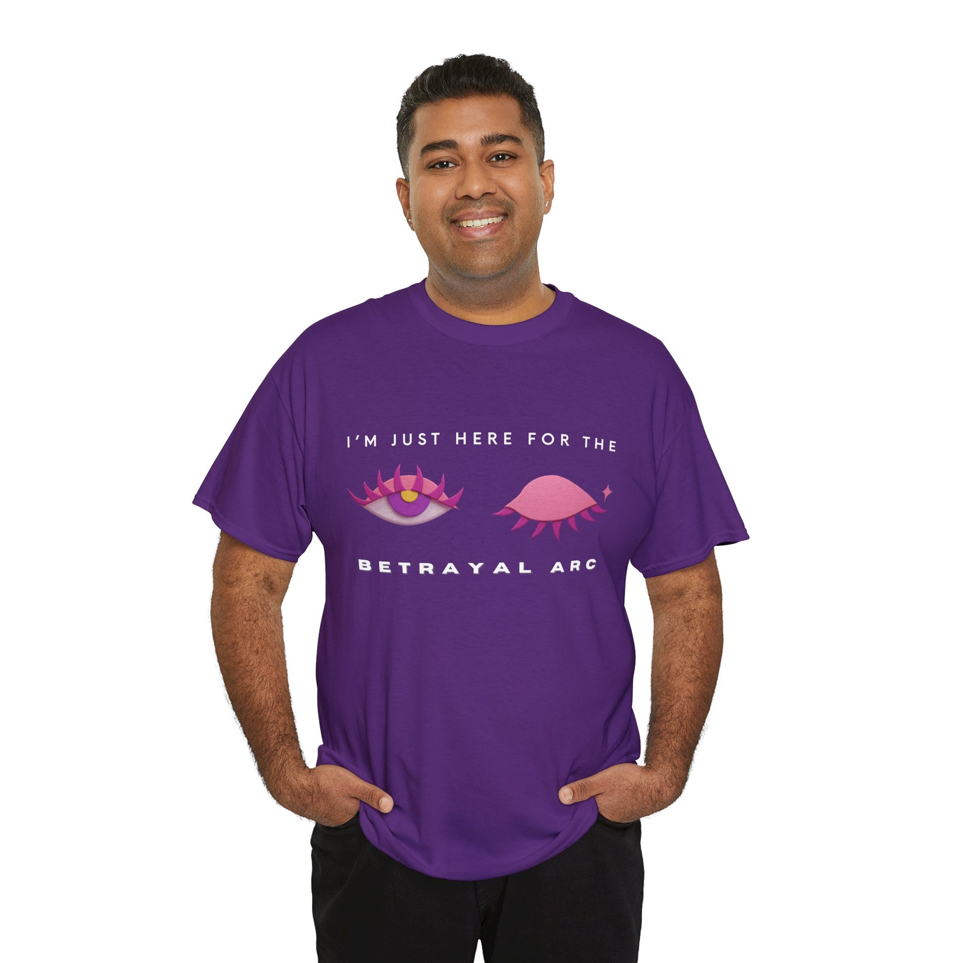 Man wearing a purple t-shirt with a winking pink and purple eye graphic, with text 'I'm Just Here For The Betrayal Arc'