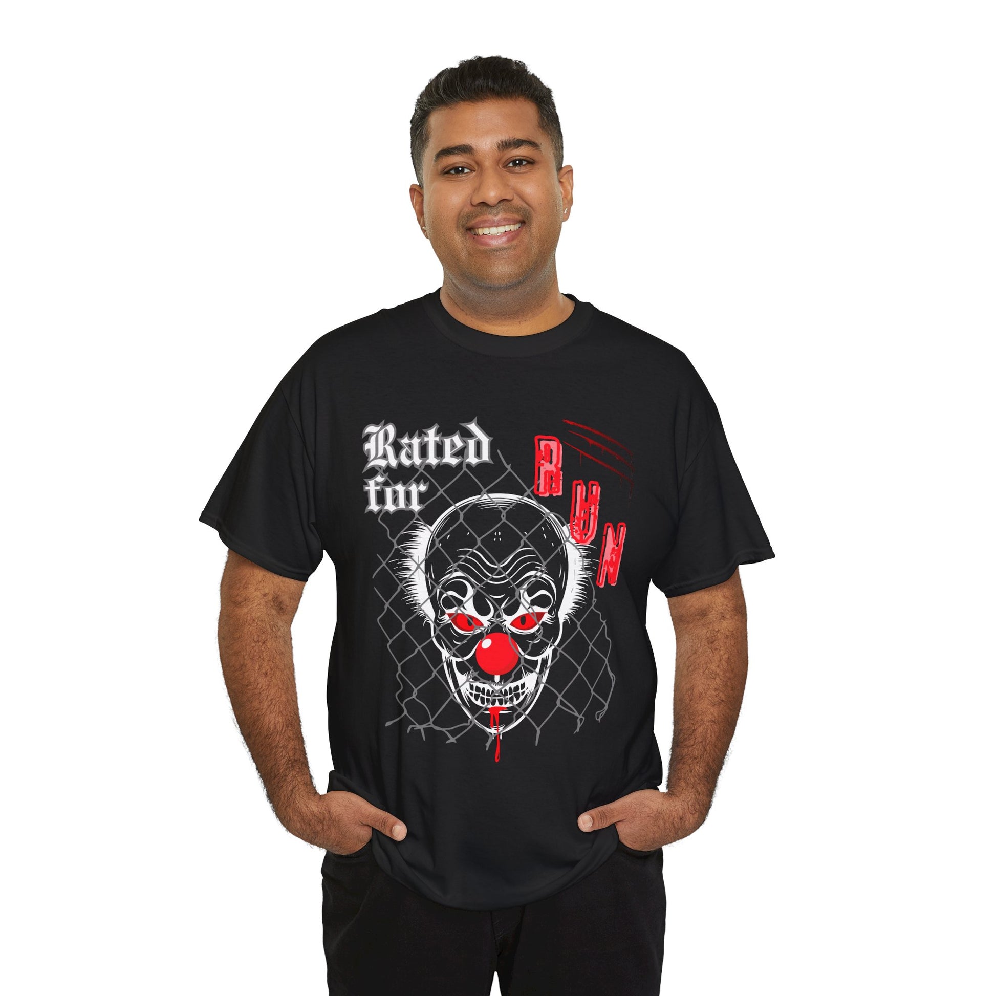 Man wearing a black horror t-shirt with a graphic design of a scary clown face behind chain linked fence and text 'Rated for R' on a hanger against a white background