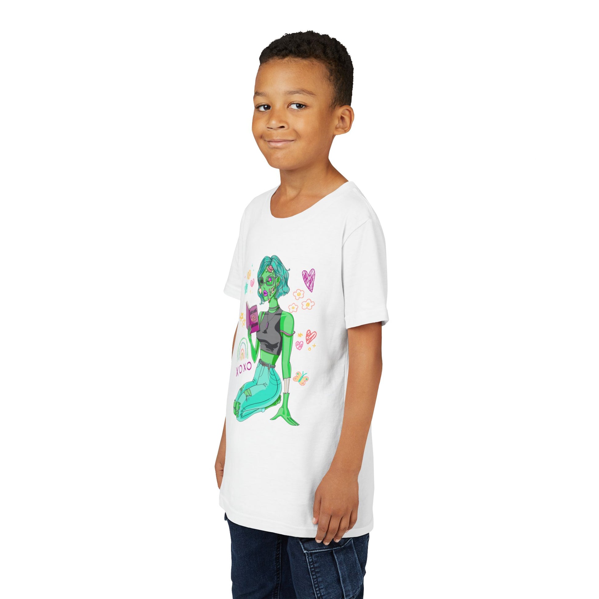 Boy wearing a white t-shirt with a girl zombie reading a book, surrounded by colorful doodles
