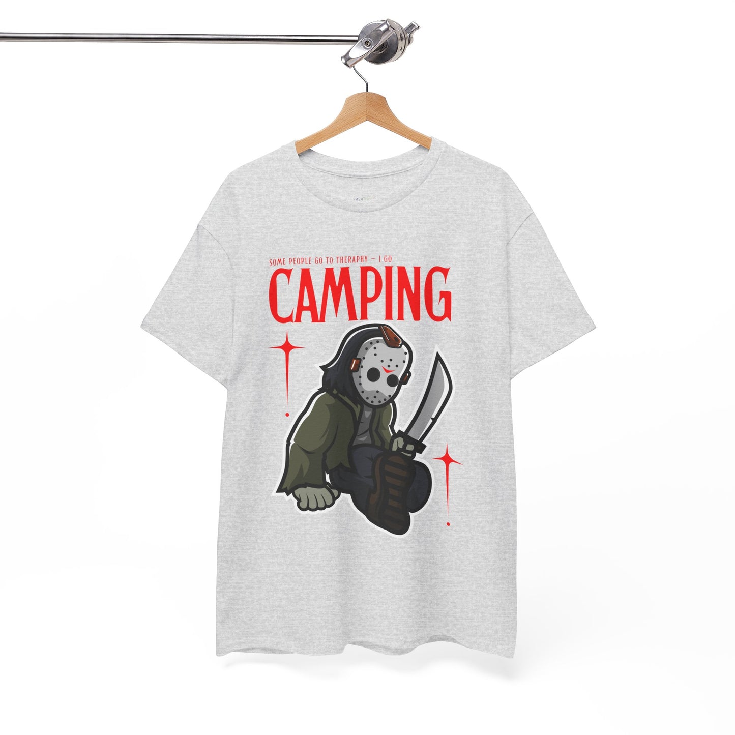 Gray t-shirt with a graphic design of a Jason character holding a knife and text 'Some People Go to Therapy...I Go CAMPING' on a hanger against a white background.
