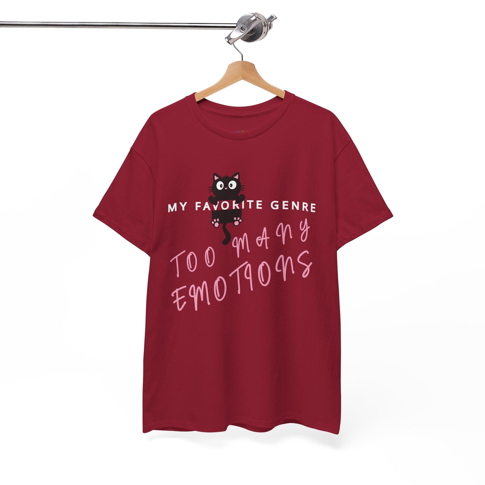 Red t-shirt with a black cat graphic hanging onto a word and text 'My Favorite Genre - Too Many Emotions' 