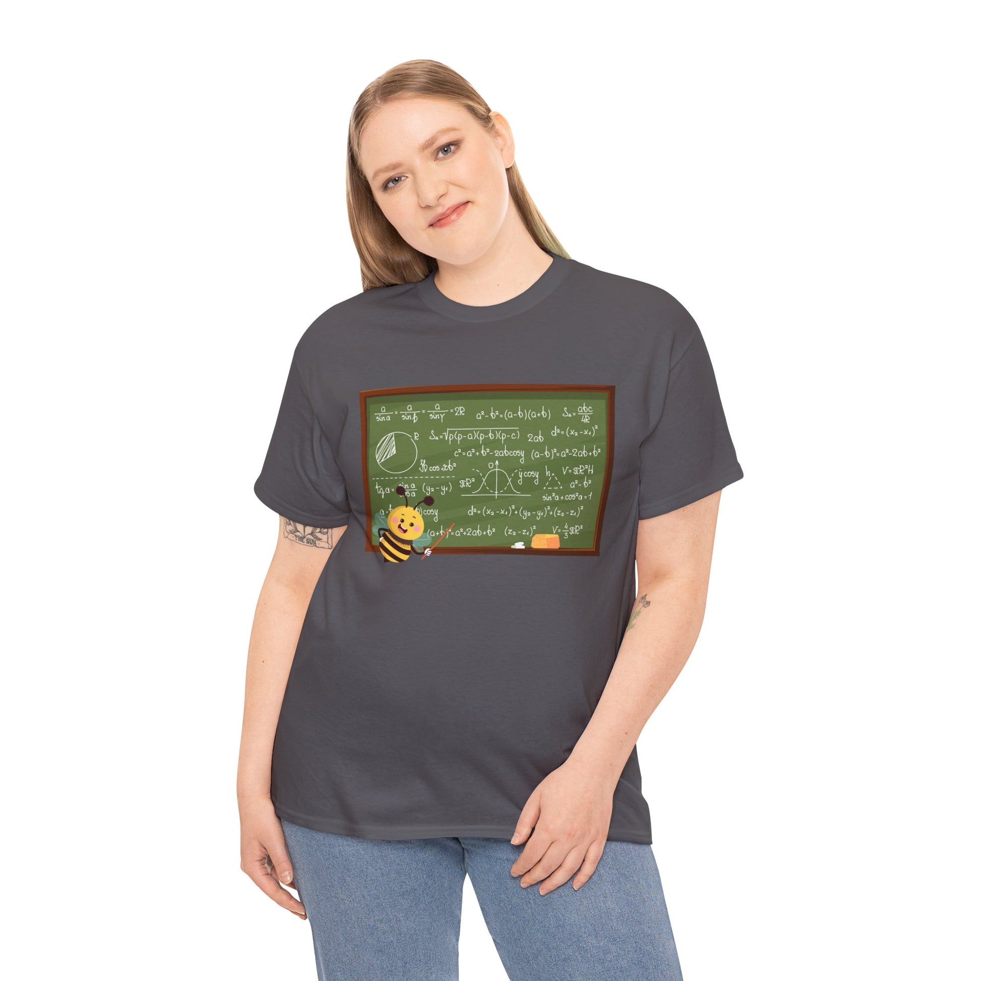 Woman wearing a gray t-shirt with a graphic of bee pointing at a chalk board with mathematical equations 