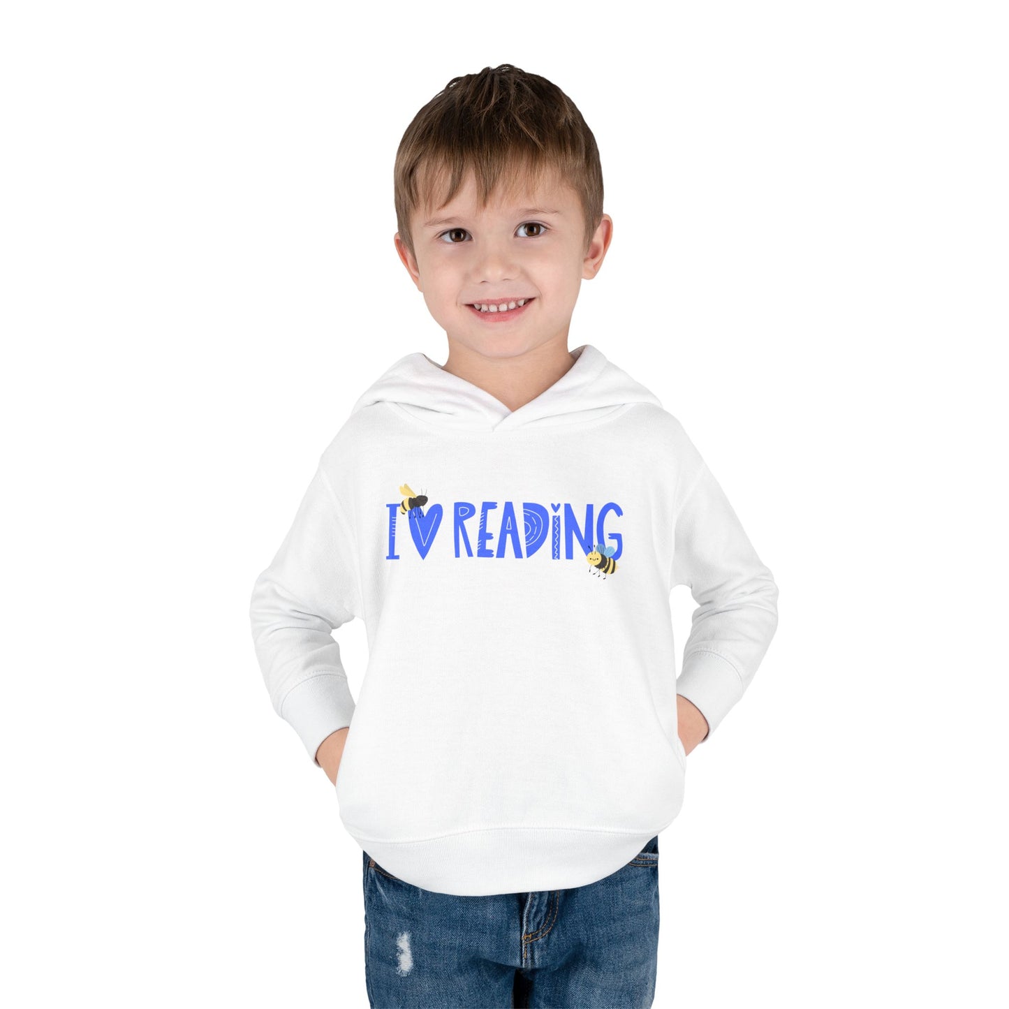 Boy wearing a white toddler hoodie with blue 'I Love Reading' text and two bumblebees