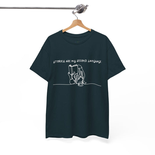 Dark (midnight) t-shirt with a white sketched design of of girl reading a book and text 'Stories Are My Second Language'