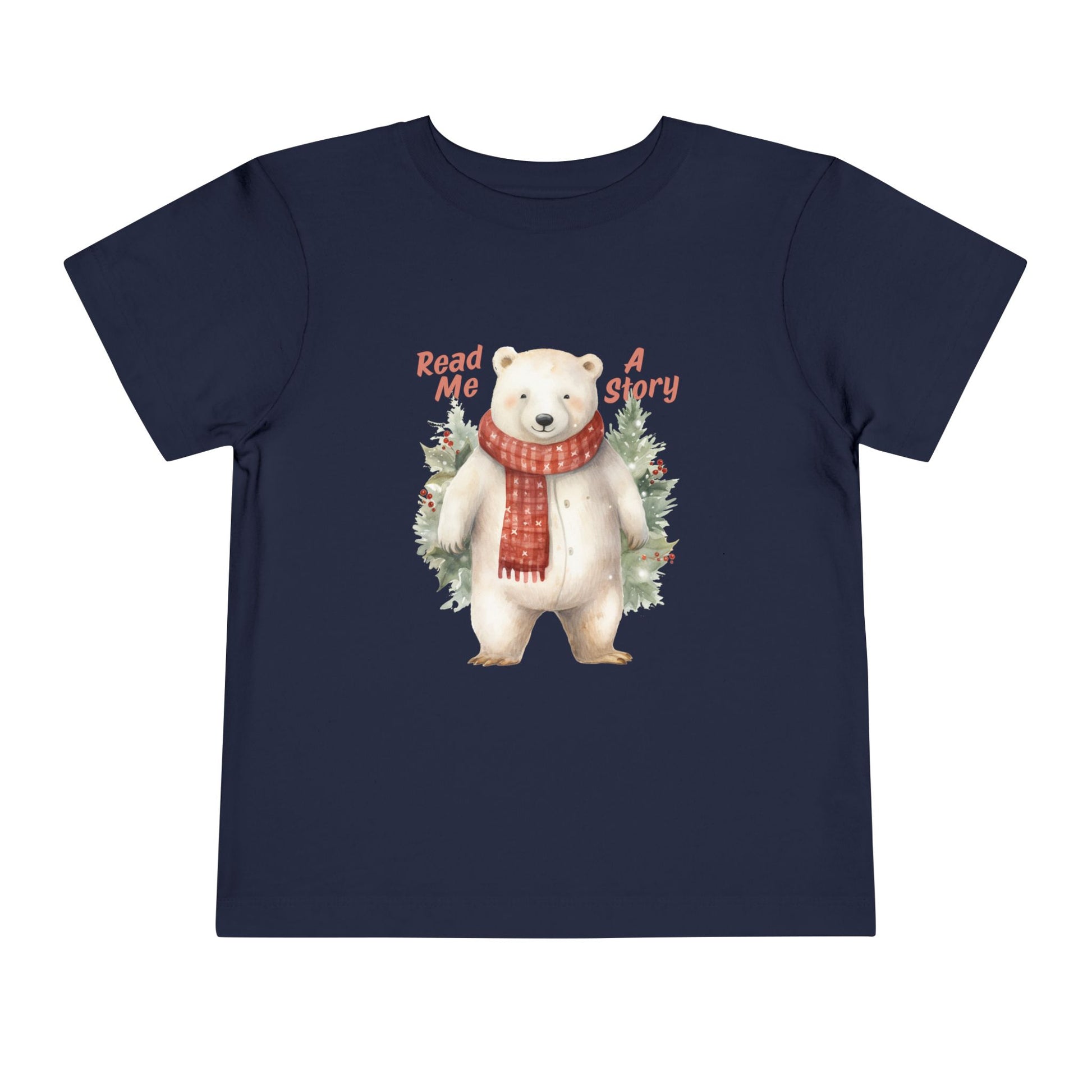 Navy blue toddler t-shirt with a polar bear wearing a scarf, surrounded by trees and text 'Read Me A Story' on a white background