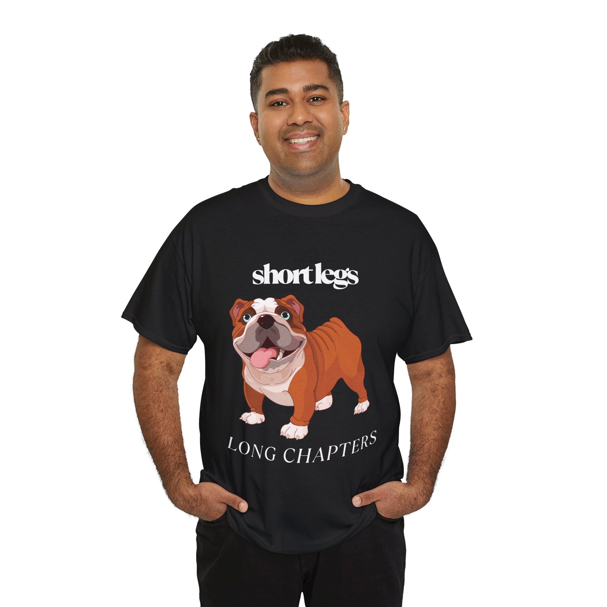 Man wearing a black t-shirt with a happy bulldog and text 'Short Lets, Long Chapters'